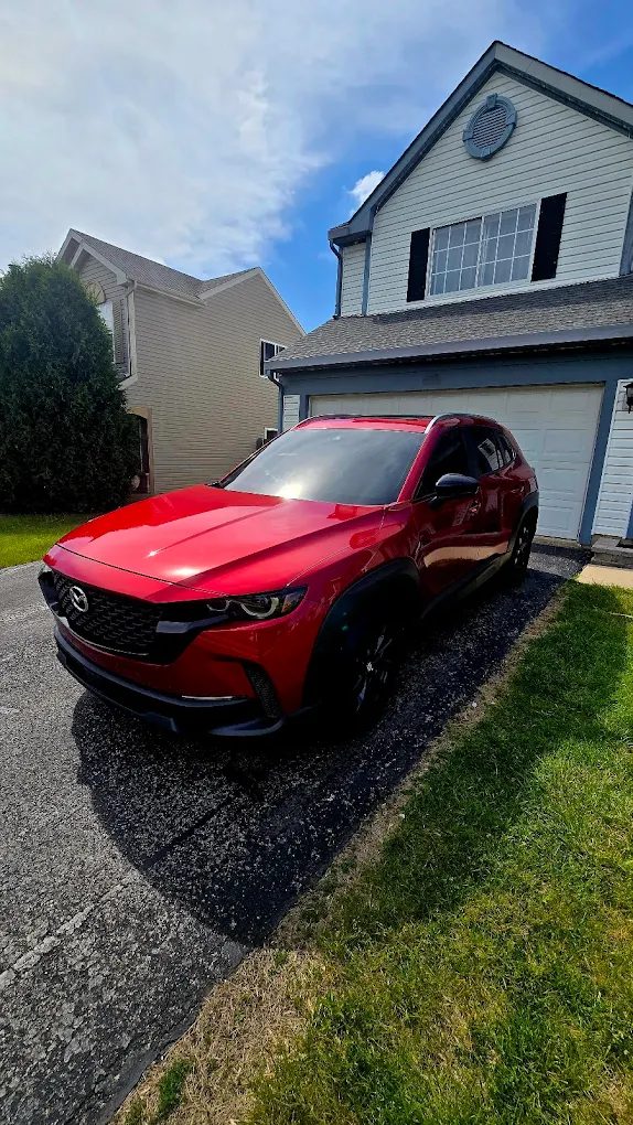 Red Mazda SUV window tint